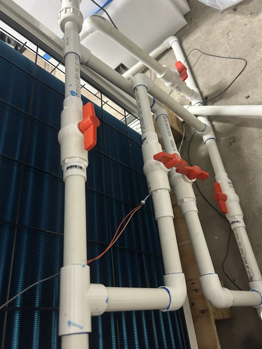 Hydronic pipework being installed at the Hawthorn home